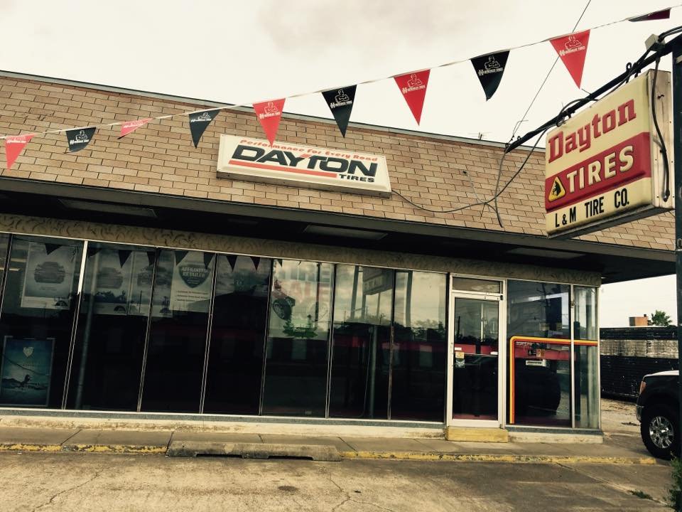 L&M Tire Co. storefront with the Dayton Tires sign on Parkerson Avenue in Crowley